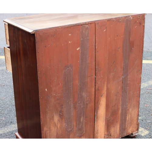 1023 - A mahogany straight front chest of drawers on bun feet, 98cm wide, 47cm deep, 110cm high. This Lot i... 