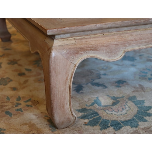 1038 - A light bleached wood effect coffee table, 152cm wide, 91cm deep, 40cm high. This Lot is not held by... 