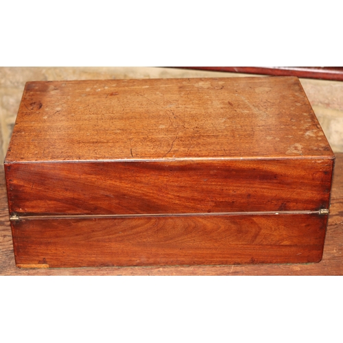 1052 - A small wooden writing box with hinged lid enclosing small interior compartments and a quantity of v... 