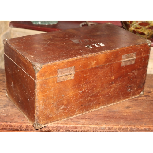 1053 - A wooden box with leather handle, metal corners and clips, RX5 painted to top, hinged lid, 49cm wide... 