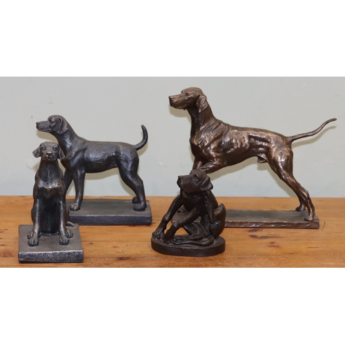 1056 - A group of dog figures, largest made of copper, 4 smaller bronze effect dogs.