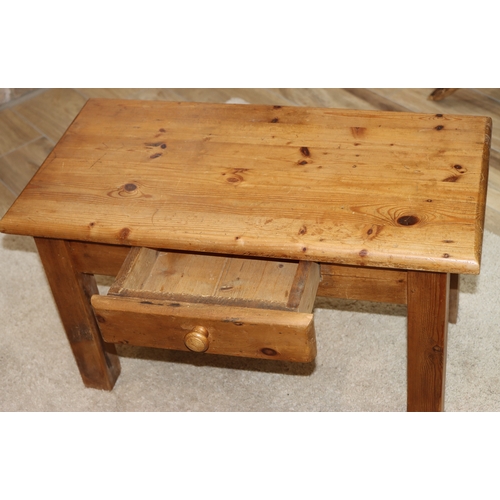 1061 - A small low pine table with 1 small drawer and knob handle, 79cm wide, 40cm deep, 45.5cm high.This L... 