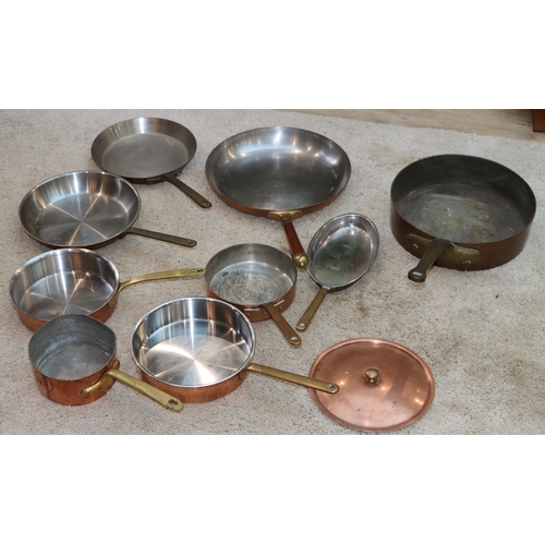 1064 - 9 various copper pans, 1 with lid.