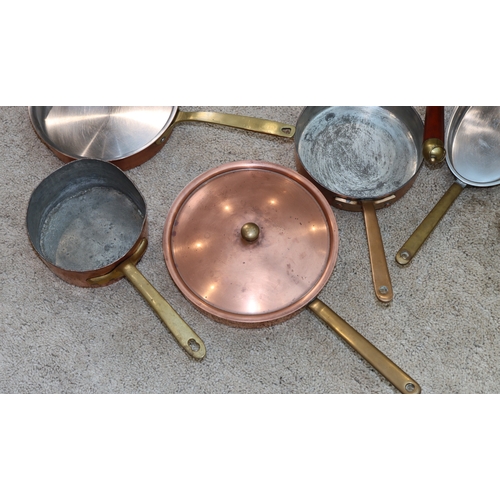 1064 - 9 various copper pans, 1 with lid.