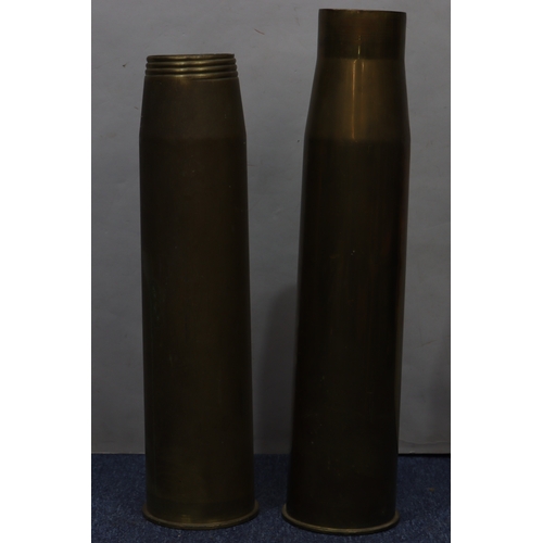 1086 - 2 long brass military shell cases, 70.3cm  and 6.2cm tall