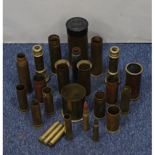 1088 - A quantity of small brass military shells etc, tallest 19cm high