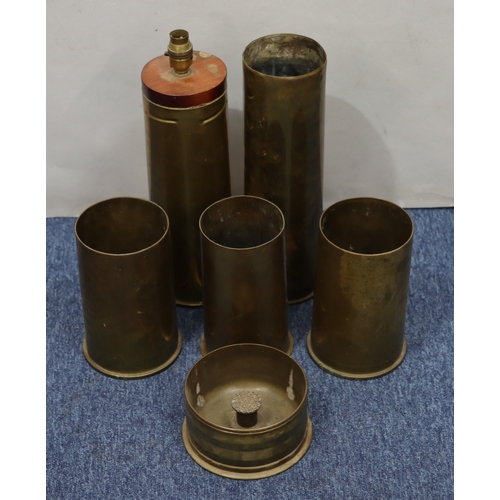 1090 - A quantity of various odd military shells, 1 converted to a lamp, 41cm high.