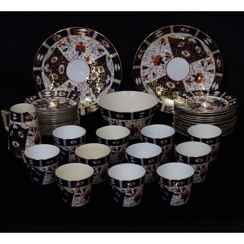 1098 - A quantity of china, 11 cups, 12 saucers, 12 side plates, 2 serving plates, 1 jug, 1 bowl.