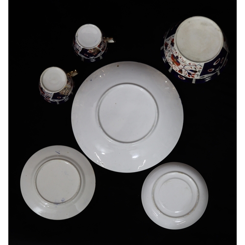 1098 - A quantity of china, 11 cups, 12 saucers, 12 side plates, 2 serving plates, 1 jug, 1 bowl.