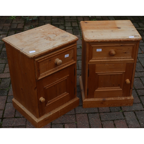 1110 - A pair of modern pine bedside cupboards with single drawers above panelled doors, 44.5cm wide, 37.5c... 