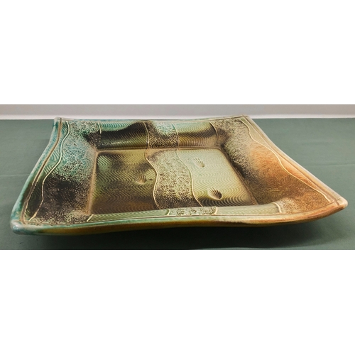 1112 - May Ling Beardsmore square salt glaze studio pottery stoneware dish with shell design, 34.5cm x 34.5... 