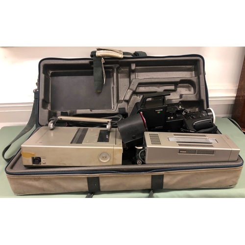 1116 - A Sony Trinicon Betamax video camera with portable video cassette recorder, additional lenses etc in... 