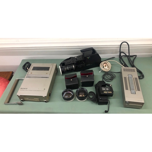 1116 - A Sony Trinicon Betamax video camera with portable video cassette recorder, additional lenses etc in... 