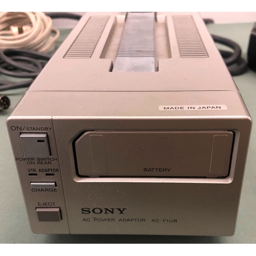 1116 - A Sony Trinicon Betamax video camera with portable video cassette recorder, additional lenses etc in... 