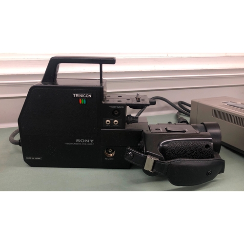 1116 - A Sony Trinicon Betamax video camera with portable video cassette recorder, additional lenses etc in... 