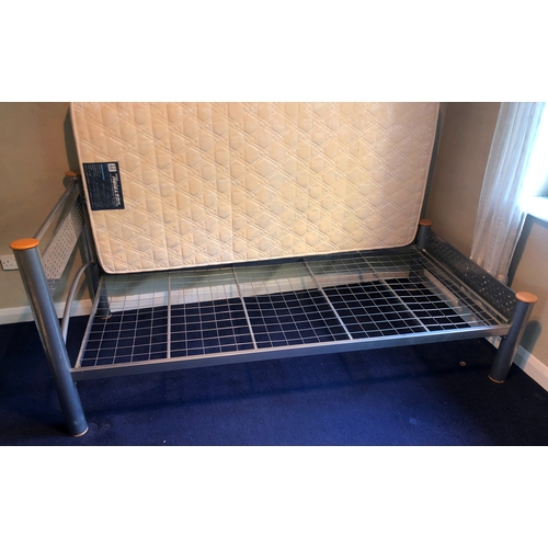 1143 - A metallic single bed frame with single mattress, frame 207cm long overall 103cm wide. This Lot is n... 