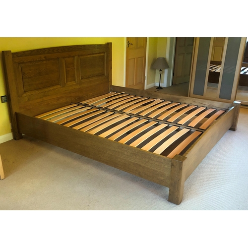 1156 - An oak bed frame with fitted headboard and footboard, wooden bed slats, frame 197cm wide, 215cm long... 