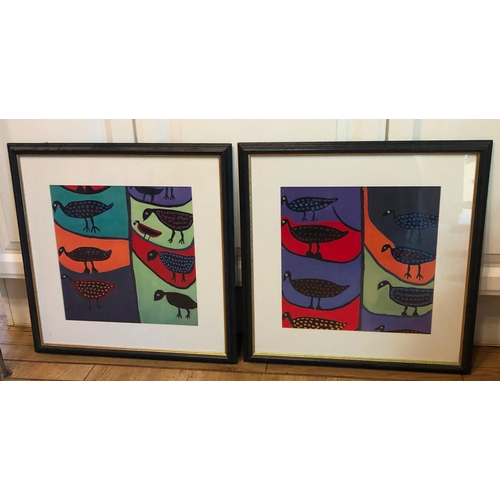 1167 - A pair of coloured prints depicting aboriginal style birds, in black and gilt frames, 37 x 37cm.