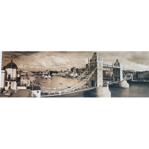 1173 - A black and white photograph of Tower Bridge in black frame and 4 prints in black and gilt frames, N... 