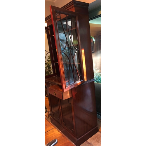 1180 - An Edwardian mahogany cabinet with 2 glazed doors enclosing 3 shelves, 2 drawers below, 2 panel cupb... 