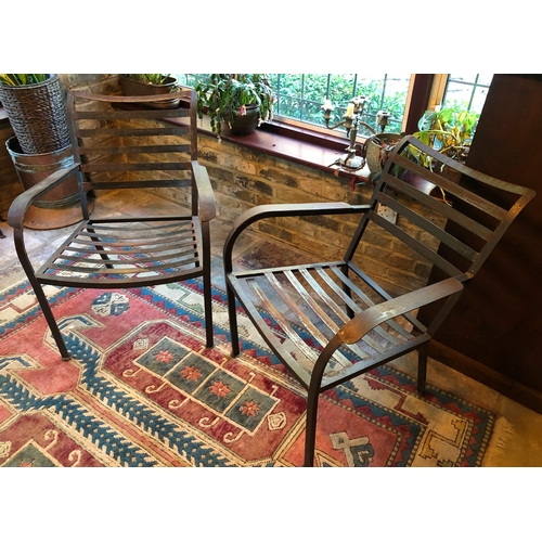 1181 - A pair of metallic chairs with multi-coloured cushions, 78cm high, 63.5cm wide. This Lot is not held... 