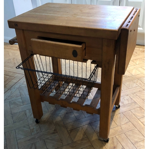 1190 - A modern butchers block on wheels, 1 wood drawer, metallic storage basket and wood wine rack below, ... 