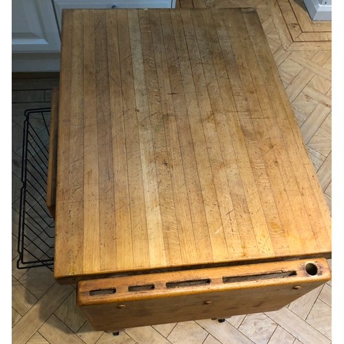 1190 - A modern butchers block on wheels, 1 wood drawer, metallic storage basket and wood wine rack below, ... 