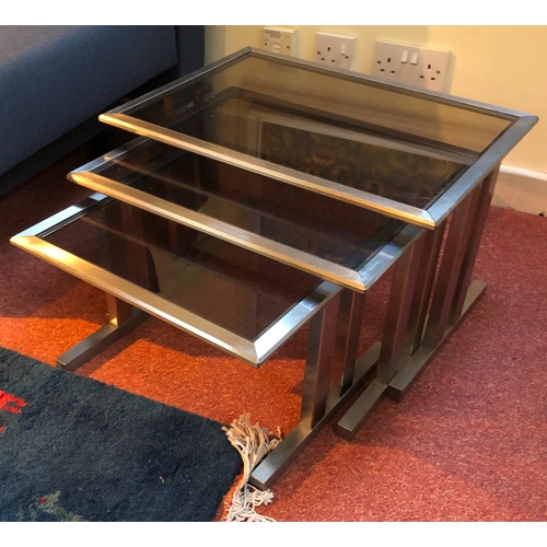 1197 - A nest of 3 metallic framed tables with grey tinted glass tops, largest, 54cm wide, 40cm deep, 32.5c... 