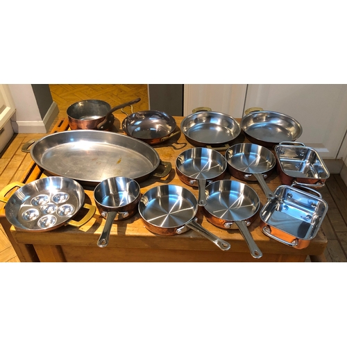 1202 - A quantity of heavy based copper and stainless steel small pans etc.