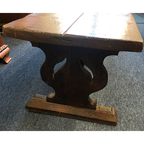 1207 - A stained pine refectory bench, 152cm wide, 42cm deep, 38cm high.