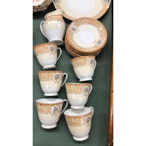 1217 - A Noritake part service, 6 cups, 6 saucers, 6 side plates, 1 jug, 1 platter, 3 Noritake cups and sau... 