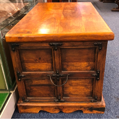 1229 - A hardwood trunk with hinged lid and metal handles and fittings, 91cm wide, 48cm deep, 45.5cm deep.