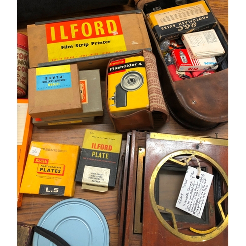 1235 - A mixed quantity of photographic parts and equipment, Olympus cameras, Ilford Plate etc.