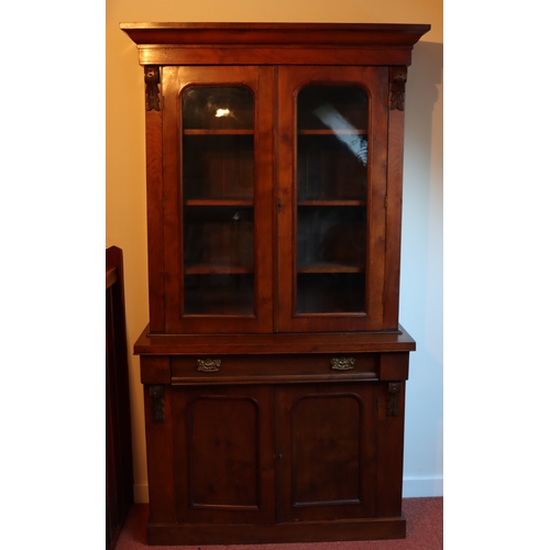 1272 - A Victorian mahogany bookcase with 2  glazed panel doors enclosing  shelves, 1 drawer and 2 panel do... 