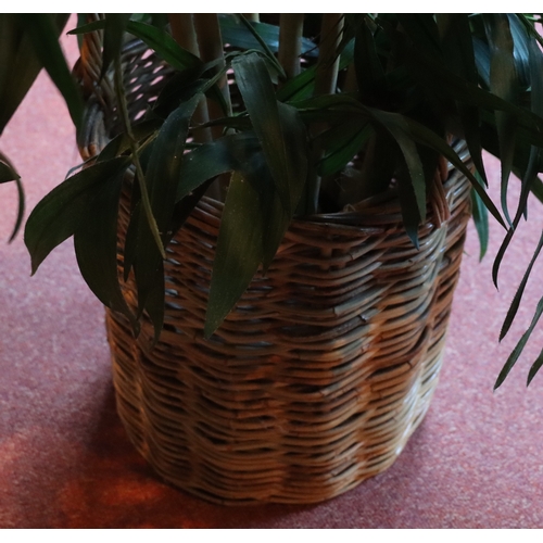 1273 - A 2-handles wicker basket, 46cm high overall with large green artifical plant, 175cm high overall. T... 