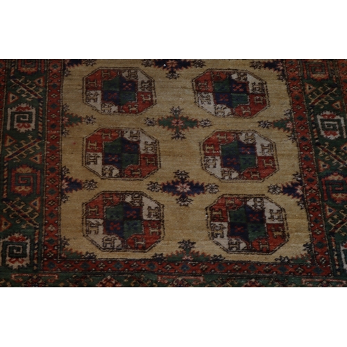 1282 - A red, cream, green and blue rug with tassels, 202 x 140cm.