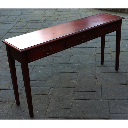 1292 - A reproduction mahogany console table with 3 drawers, brass pull handles, makers mark Brandley Engla... 