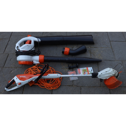 1294 - An Stihl electric garden strimmer, model  FSA458 and an Stihl leaf blower, model FHE71. This Lot is ... 