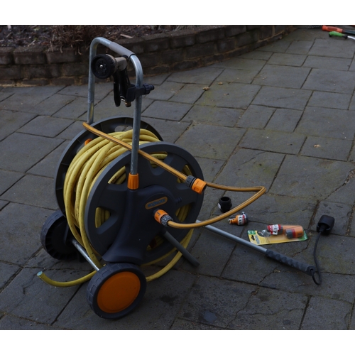 1297 - A Hozelock hose and reel on wheels and various attachments. This Lot is not held by PF Windibank. Pl... 