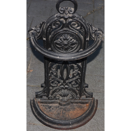 1298 - A wrought iron umbrella stand, 74cm high, 45cm wide, 23cm deep. This Lot is not held by PF Windibank... 