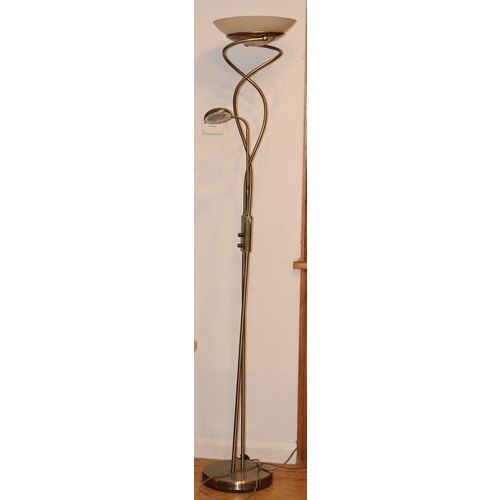 1062 - A modern floor lamp on circular metallic base with large metallic and frosted glass shade and small ... 