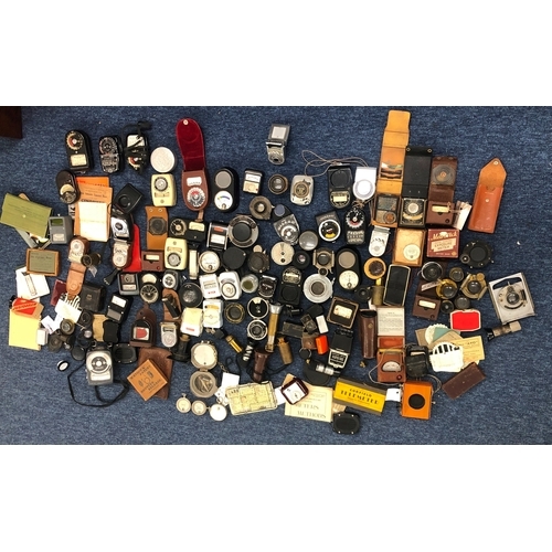 1139 - A large collection of various light exposure meters, lenses, Watkins Bee Meters etc.