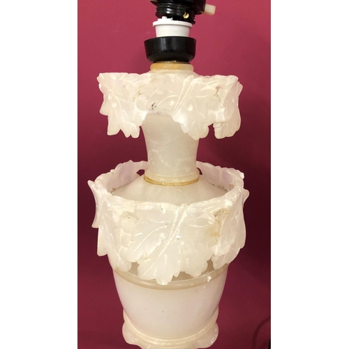 1239 - An alabaster lamp with leaf pattern, 52cm high overall.