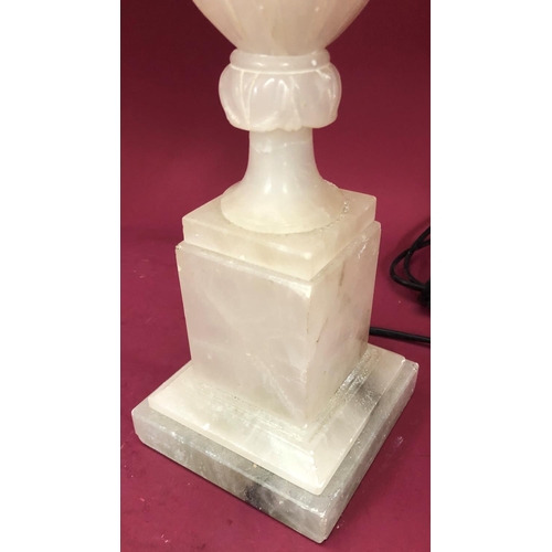 1239 - An alabaster lamp with leaf pattern, 52cm high overall.