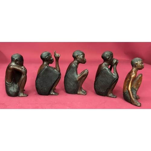 1252 - A group of African carved wood figures. (5)