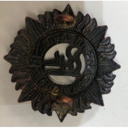 852 - A large quantity of various military and other badges including belts etc.