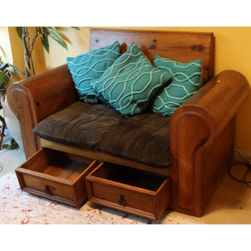 2302 - A stained pine 2-seater bench with 2 drawers below, with cushions and 2 turquoise scatter cushions, ... 