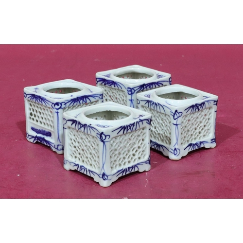 102 - 4 Oriental small square blue and white pots with pierced decoration, 6.7cm wide (4)