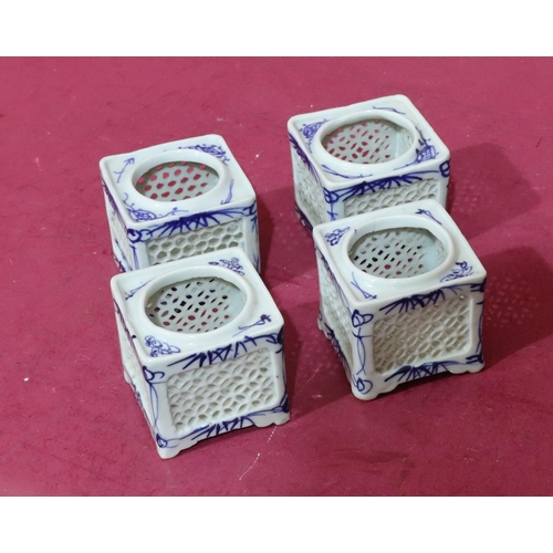 102 - 4 Oriental small square blue and white pots with pierced decoration, 6.7cm wide (4)