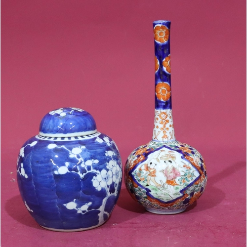 105 - An Imari round bulbous thin neck vase with multicoloured figure, floral and leaf decoration, 25cm hi... 